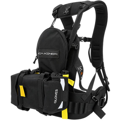 Black wildland radio chest harness pack with adjustable straps, pockets, and yellow pull tabs.